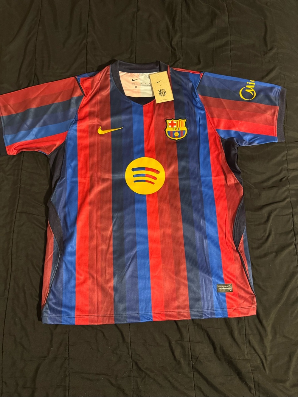 Nike fc Barcelona men hereBlue and Red Striped Soccer Jersey with Yellow Accents